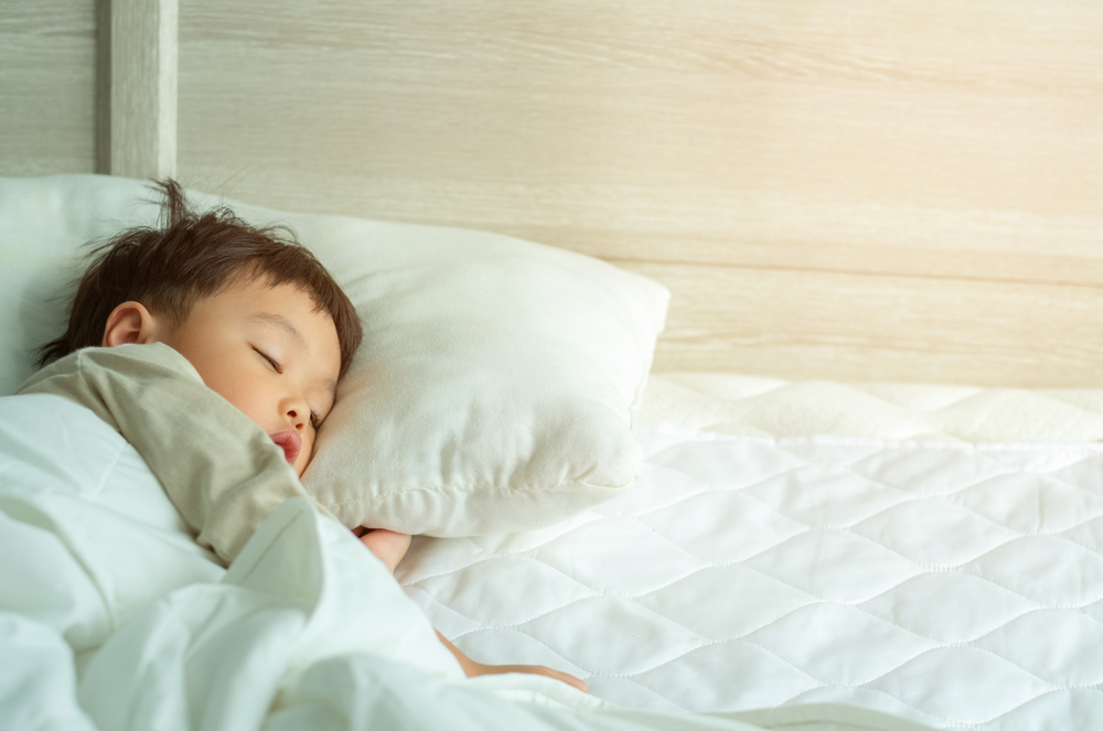 À partir de quel âge un oreiller devient-il nécessaire pour le confort d'un enfant ?